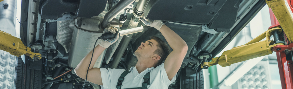 Mechanic servicing a vehicle - Car Servicing Whitby